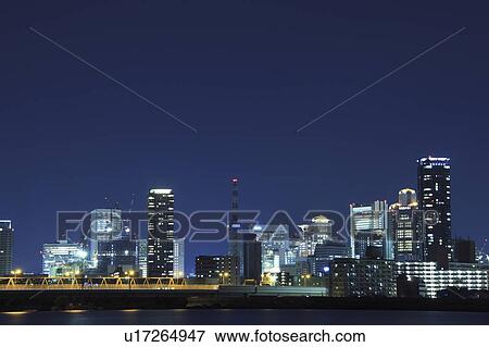 Skyline of Osaka at night, Osaka city, Osaka Prefecture, Honshu, Japan View Large Photo Image Stock Photo - Skyline of Osaka at night, Osaka city, Osaka Prefecture, Honshu, Japan. Fotosearch