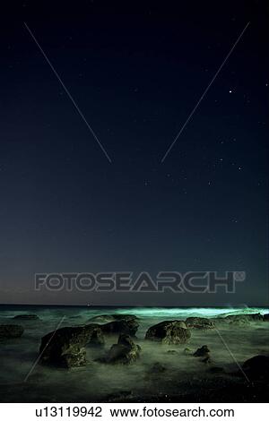 Stock Image - Starry Sky Over Ocean. Fotosearch