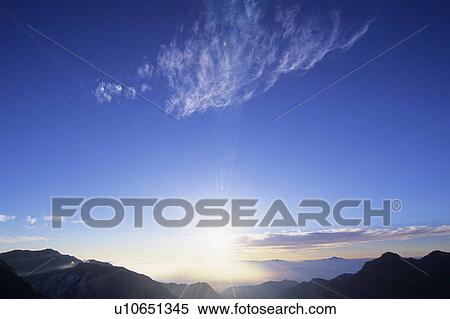 Stock Photography - Sun Over Mountains. Fotosearch