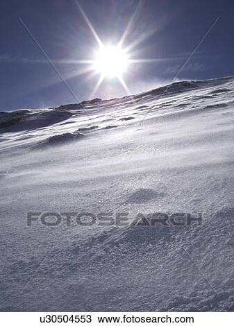 Stock Image - Sun Over Winter Landscape. Fotosearch