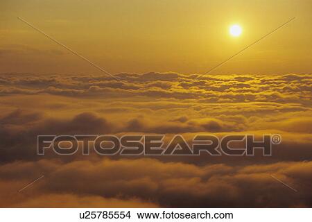 Sun Rising Above Clouds View Large Photo Image Picture - Sun Rising Above Clouds. Fotosearch