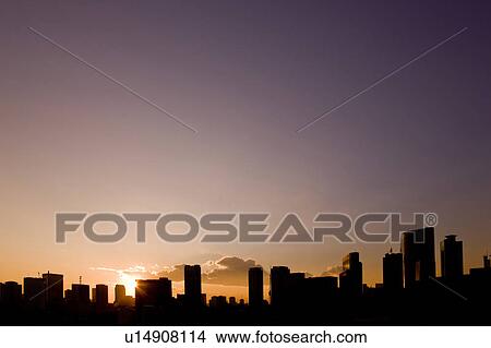 Picture - Sun Setting Over Shiodome. Fotosearch
