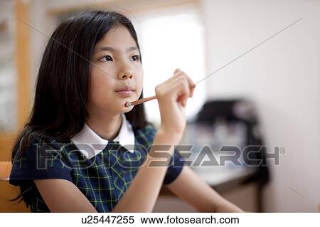 Stock Photography - Teenage girl studying . Fotosearch