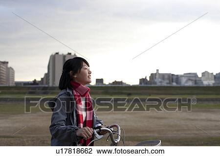 Teenage Girl with Bicycle View Large Photo Image Stock Image - Teenage Girl with Bicycle. Fotosearch