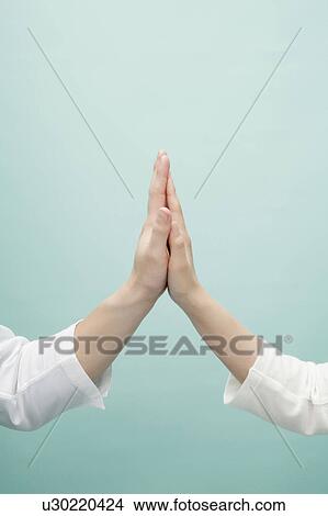 Touching hands View Large Photo Image Picture - Touching hands. Fotosearch
