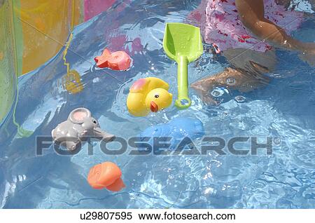 Toy floating in wading pool, Chiba Prefecture, Honshu, Japan View Large Photo Image Stock Photography - Toy floating in wading pool, Chiba Prefecture, Honshu, Japan. Fotosearch
