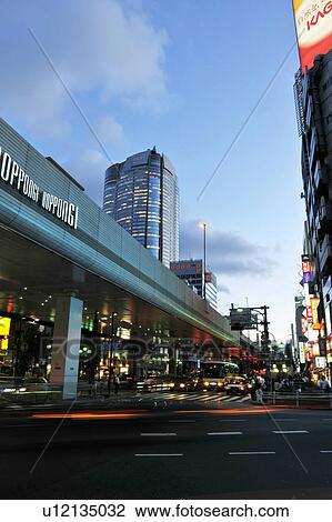 Stock Image - Traffic in Roppongi, Tokyo Prefecture, Honshu, Japan. Fotosearch