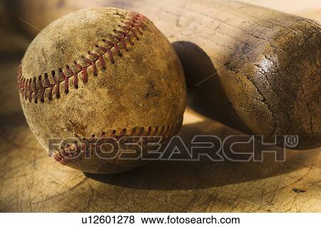Antique baseball with baseball bat View Large Photo Image Stock Photo - Antique baseball with baseball bat. Fotosearch