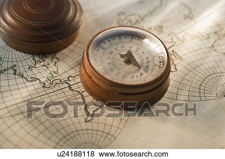 Antique compass on map View Large Photo Image Stock Photo - Antique compass on map. Fotosearch