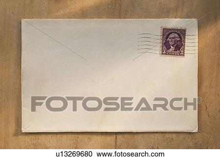 Blank envelope on wooden table View Large Photo Image Stock Image - Blank envelope on wooden table. Fotosearch