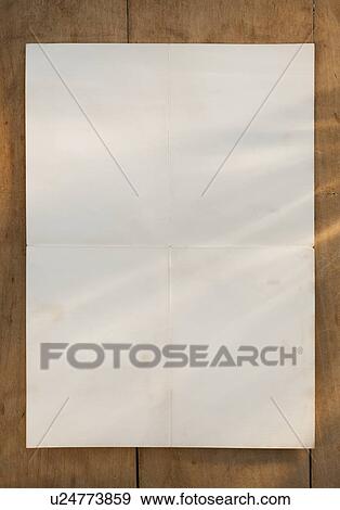Stock Photo - Blank page on wooden table. Fotosearch