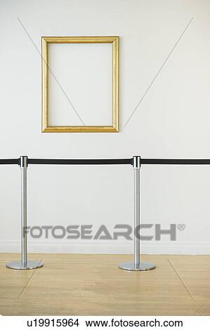 Picture - Blank picture frame in empty art gallery. Fotosearch