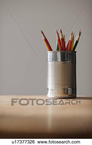 Can with pencils on table View Large Photo Image Stock Photograph - Can with pencils on table. Fotosearch
