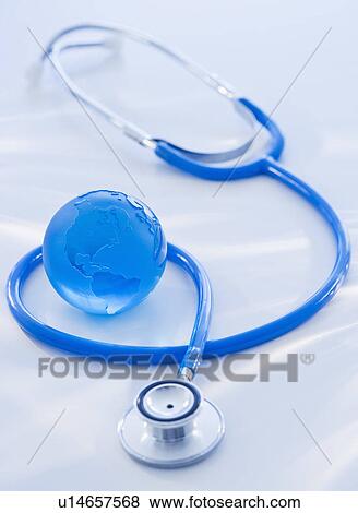 Close-up view of blue globe with stethoscope View Large Photo Image Stock Photo - Close-up view of blue globe with stethoscope. Fotosearch