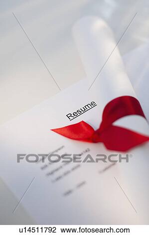 Stock Image - Diploma on resume. Fotosearch