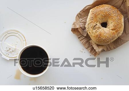 Donut and cup of coffee View Large Photo Image Stock Image - Donut and cup of coffee. Fotosearch