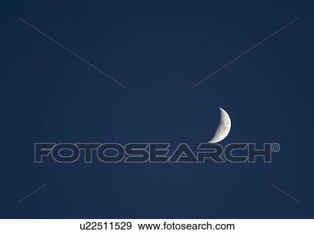 Stock Photo - Half moon on sky. Fotosearch