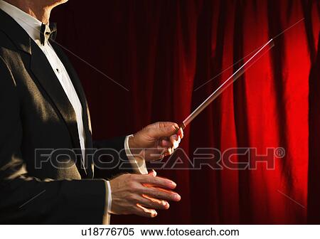 Midsection of orchestra conductor View Large Photo Image Stock Photography - Midsection of orchestra conductor. Fotosearch