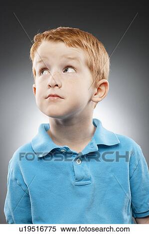 Retrato De Sorrindo Ruivo Menino 4 5 Desgastar Azul Camisa Polo E Olhar Tiro Estudio Arquivos De Fotografia U19516775 Fotosearch