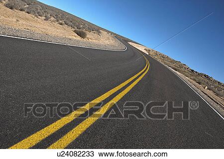 Road through desert View Large Photo Image Stock Image - Road through desert. Fotosearch