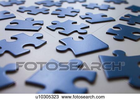 Scattered blue jigsaw pieces View Large Photo Image Stock Image - Scattered blue jigsaw pieces. Fotosearch