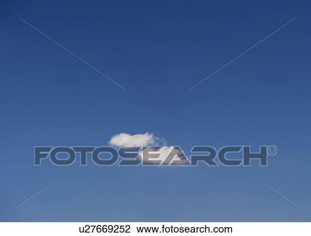 Stock Image - Single cloud in blue sky. Fotosearch