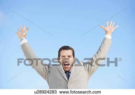 South Africa, Happy businessman, low angle view View Large Photo Image Stock Image - South Africa, Happy businessman, low angle view. Fotosearch