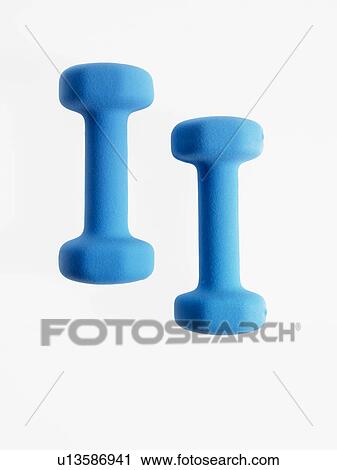 Stock Image - Studio shot of blue dumbbells. Fotosearch