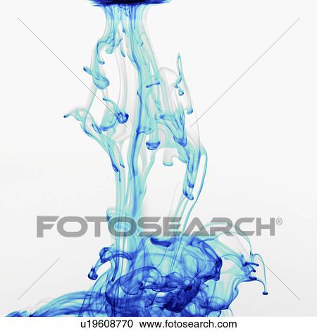 Stock Image - Studio shot of blue dye in abstract shape. Fotosearch