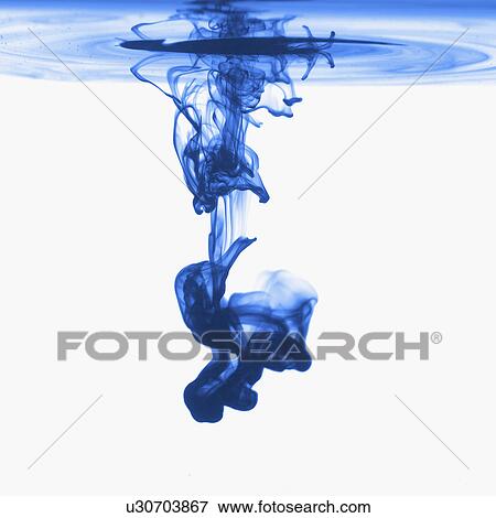 Stock Photo - Studio shot of blue dye in abstract shape. Fotosearch