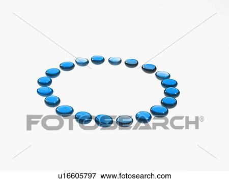 Stock Photo - Studio shot of blue glass beads in circle. Fotosearch