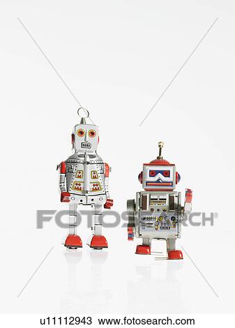 Stock Image - Studio shot of book robots. Fotosearch