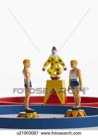 Studio shot of figurines of acrobats View Large Photo Image Stock Photo - Studio shot of figurines of acrobats. Fotosearch