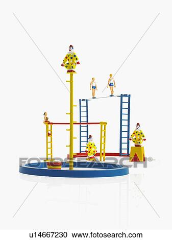 Studio shot of figurines on ladders View Large Photo Image Stock Image - Studio shot of figurines on ladders. Fotosearch