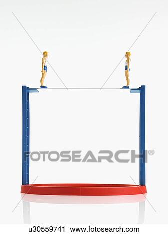Stock Image - Studio shot of figurines on ladders. Fotosearch