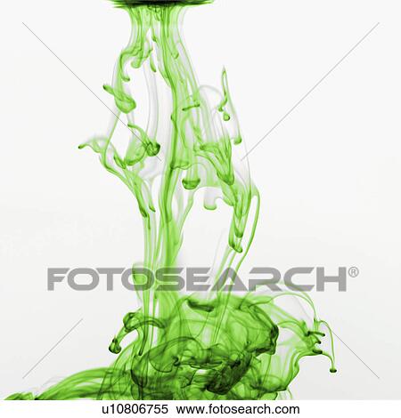 Stock Photography - Studio shot of green dye in abstract shape. Fotosearch