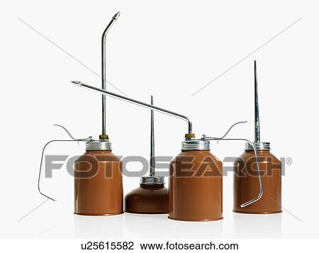 Studio shot of oil cans View Large Photo Image Stock Image - Studio shot of oil cans. Fotosearch