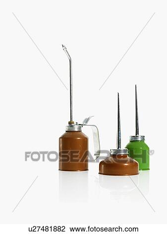 Studio shot of oil cans View Large Photo Image Stock Image - Studio shot of oil cans. Fotosearch