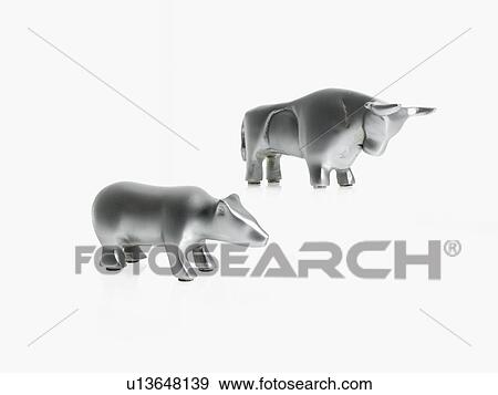 Studio shot of silver figurines of bull and bear View Large Photo Image Stock Photo - Studio shot of silver figurines of bull and bear. Fotosearch