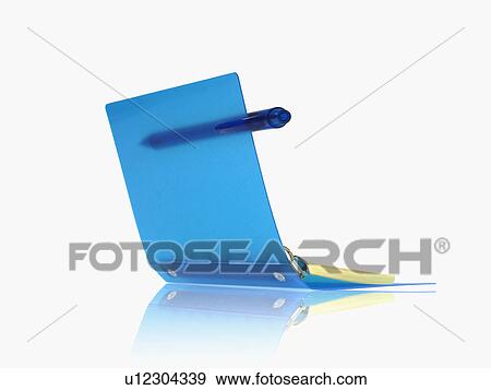 Stock Photo - Studio shot of spiral notebook with pen. Fotosearch