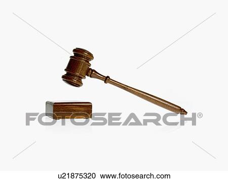 Stock Image - Studio shot of wooden court gavel. Fotosearch