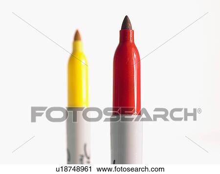 Stock Image - Studio shot red and yellow felt-tip pen. Fotosearch