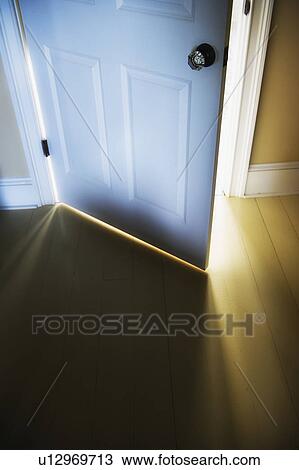 Sunlight shining through open door View Large Photo Image Stock Image - Sunlight shining through open door . Fotosearch