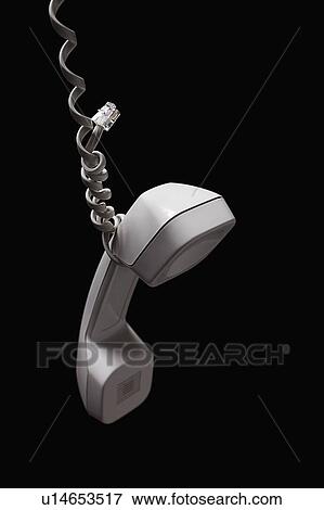 Telephone receiver on black background View Large Photo Image Stock Photo - Telephone receiver on black background. Fotosearch