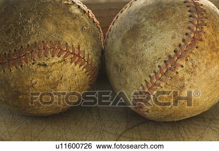 Stock Photograph - Two antique baseballs. Fotosearch