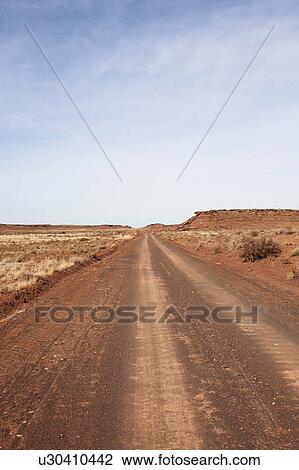 USA, Arizona, Winslow, Dirt road going forward View Large Photo Image Stock Image - USA, Arizona, Winslow, Dirt road going forward. Fotosearch