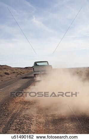 USA, Arizona, Winslow, Pick-up truck driving View Large Photo Image Stock Image - USA, Arizona, Winslow, Pick-up truck driving. Fotosearch