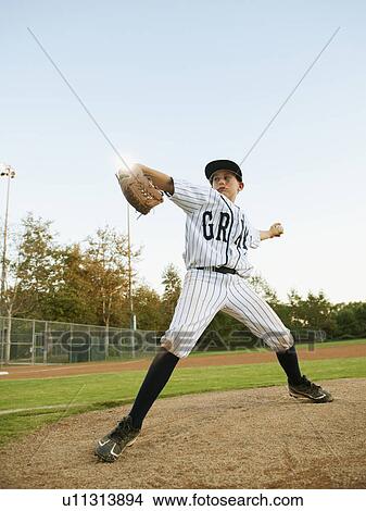 Picture - USA, California, Ladera Ranch, boy (10-11) playing baseball. Fotosearch