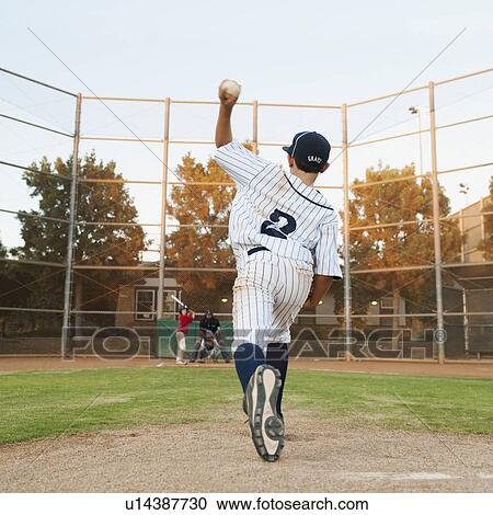 Stock Image - USA, California, Ladera Ranch, boy (10-11) playing baseball. Fotosearch