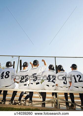 USA, California, Ladera Ranch, Boys (10-11) from little league sitting on bench, rear view View Large Photo Image Stock Image - USA, California, Ladera Ranch, Boys (10-11) from little league sitting on bench, rear view. Fotosearch